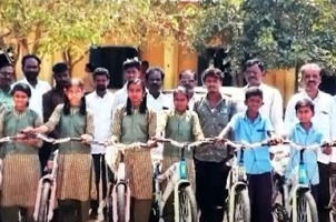 A poor worker bought a bicycle for 11 students with his own money