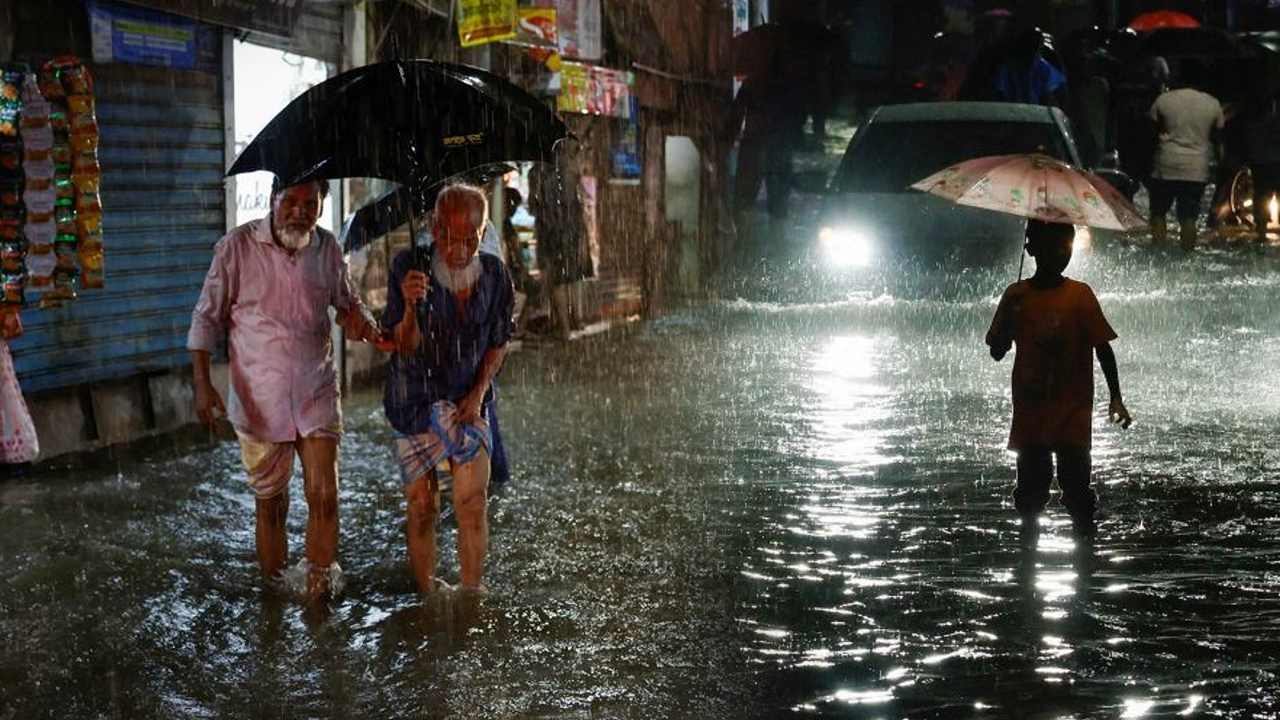 The roads are flooded in the first rain of the season.