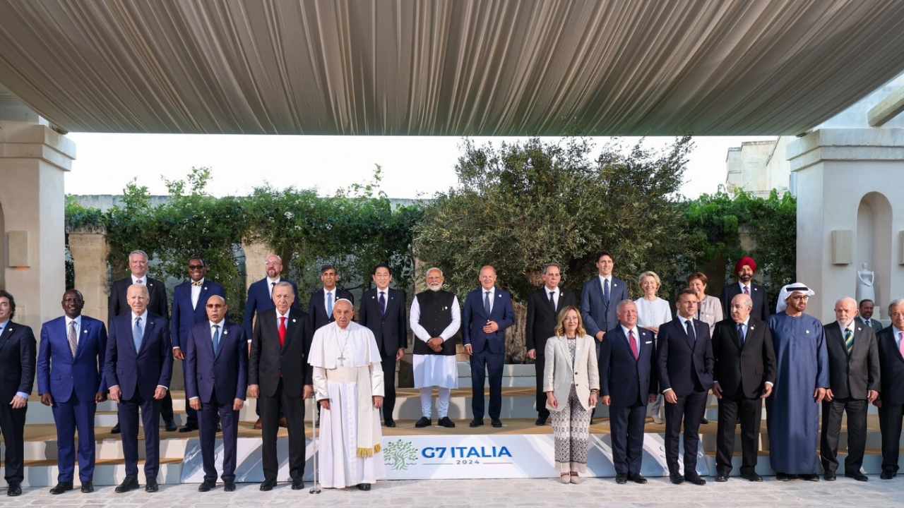 Narendra Modi grabbed everyone's attention with a family photo at the G7 Summit.