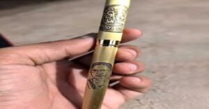 Mamata Banerjee face in gold pen