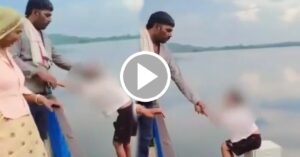 Viral Video the father placed his son on an iron rod hanging over the river