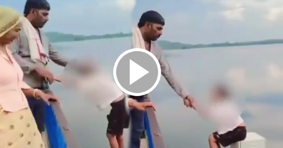 Viral Video the father placed his son on an iron rod hanging over the river