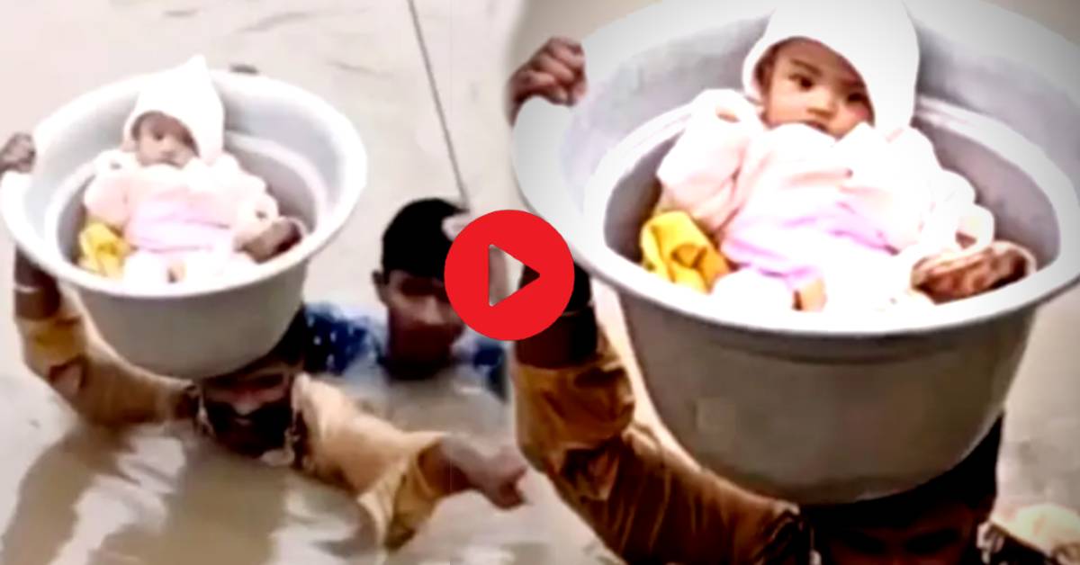 Viral video Father holds son by the head in water