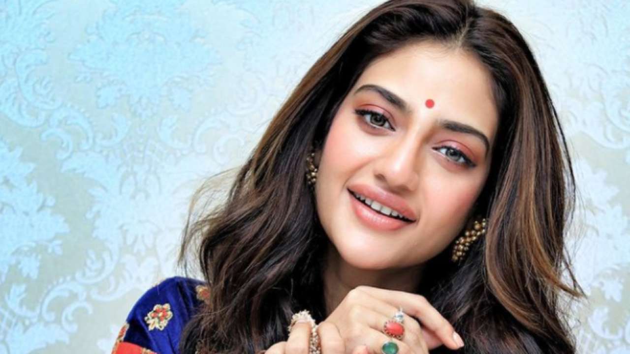 How does nusrat jahan spend Durga Puja 