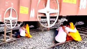 Viral Video close couple sitting under the train another truth behind the video