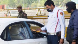 Know how to file a complaint against e-challan without violating any traffic signals?
