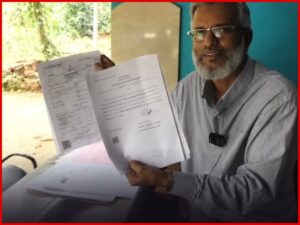 A Kerala man got the Government Job letter after 18 years at the age of 61 years age.