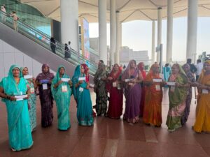 The first flight took off from Noida International Airport carrying farmers who had provided the land.