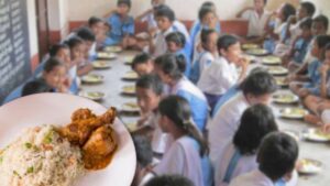 Children delighted to get fried rice and meat in their mid-day meal